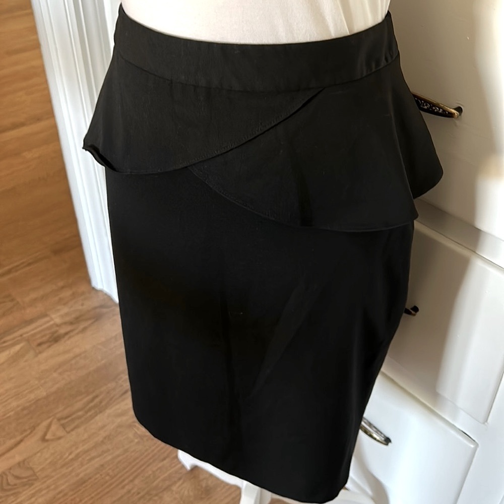 Express pencil skirt with peplum ruffle. Black. Excellent used condition.